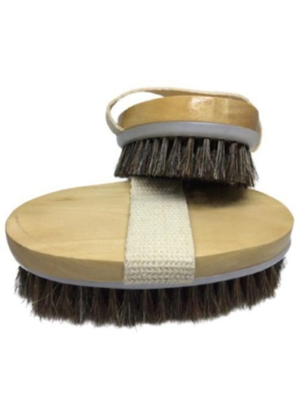 فرشاة لتنظيف الخيول 