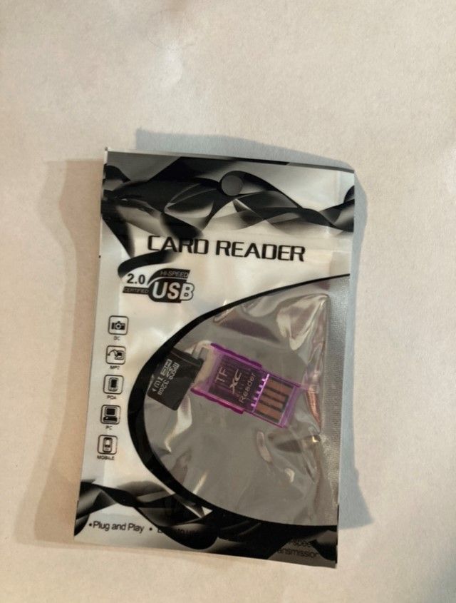 1 × قارئ بطاقات USB صغير + ذاكرة 32 جيجا
